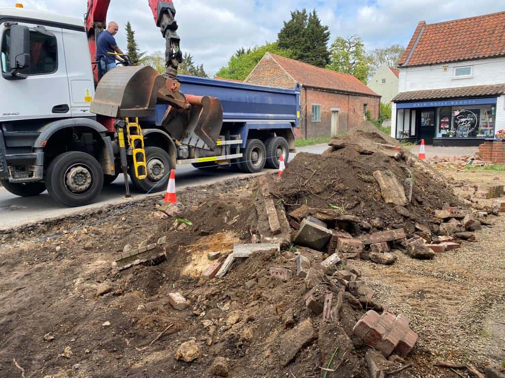 This is a photo of a dig out being carried out for the installation of a new tarmac driveway. Works being carried out by Dover Driveways