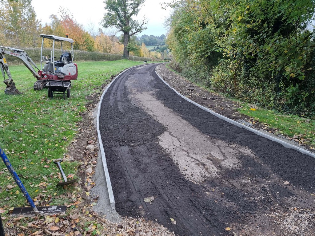 This is a large driveway which is in the process of having a tar and chip driveway installed on by Dover Driveways